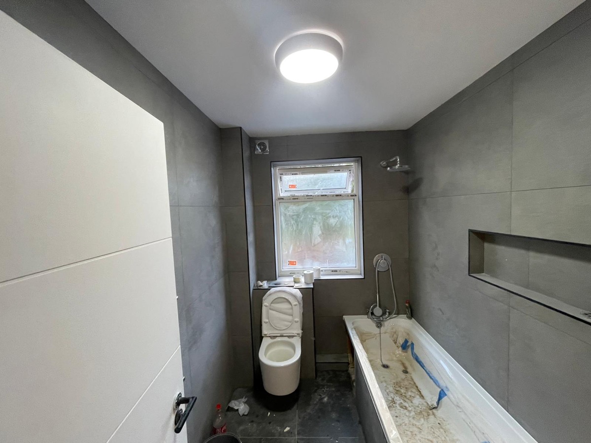 Bathroom tiling in progress